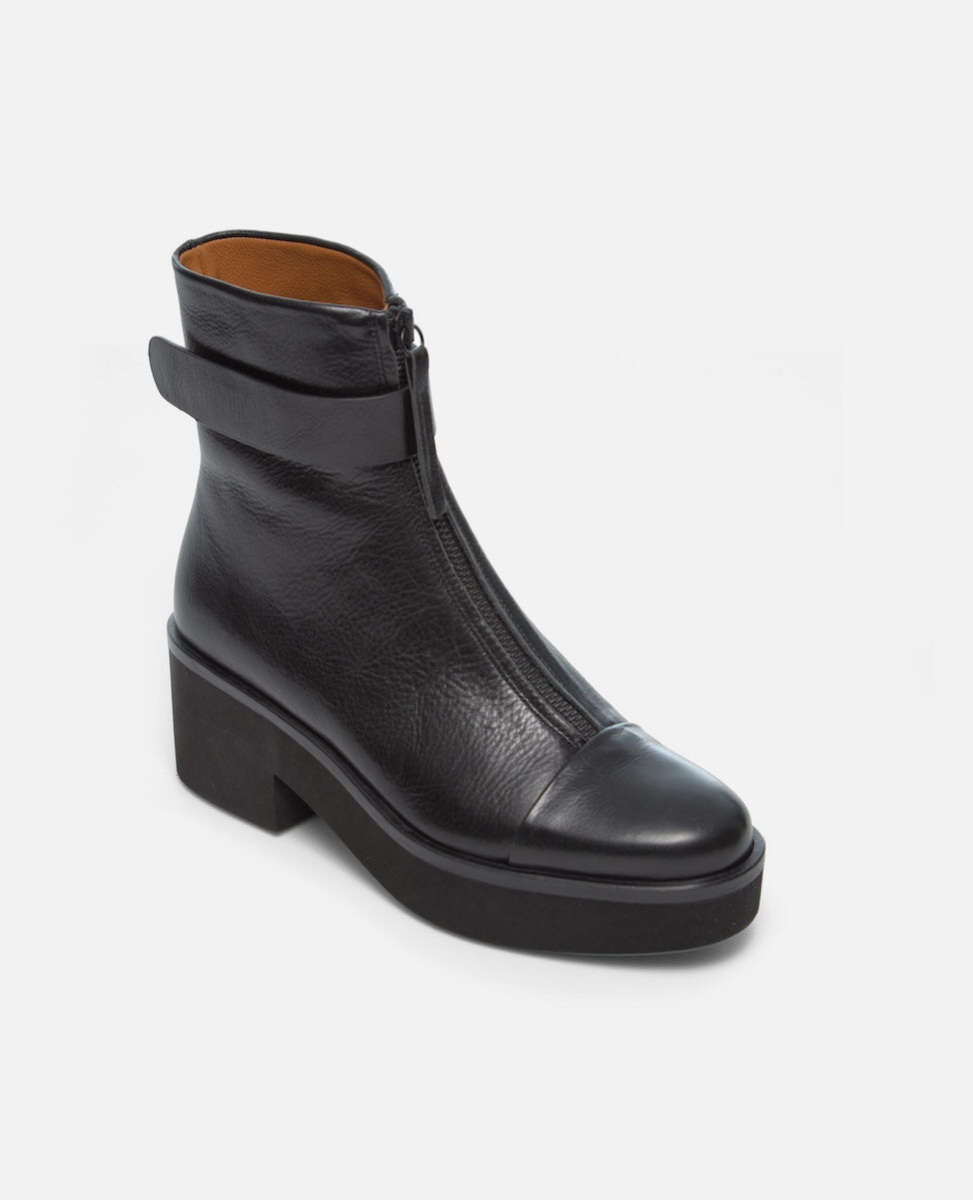 Black leather ankle boot on a white background