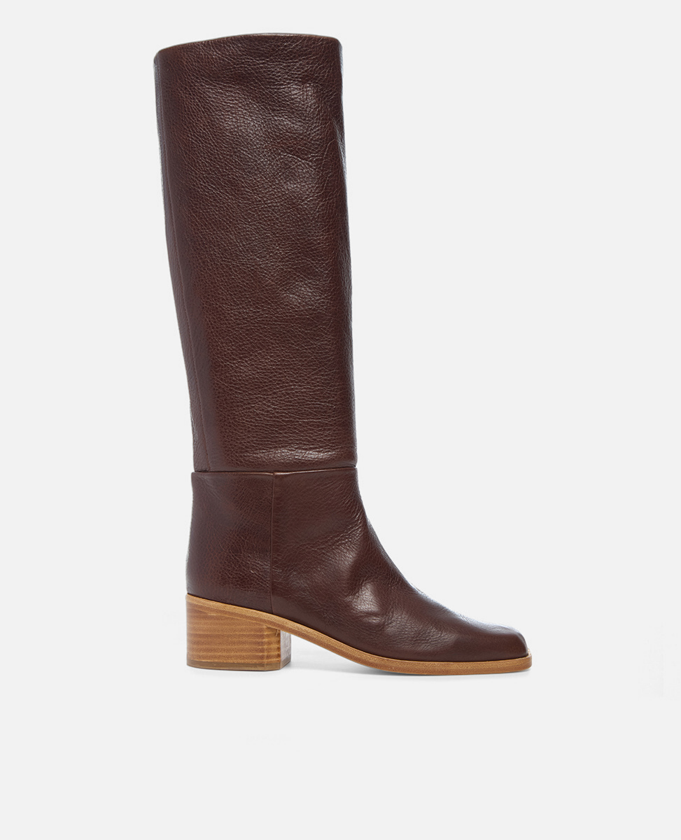 Brown knee-high boot on a white background