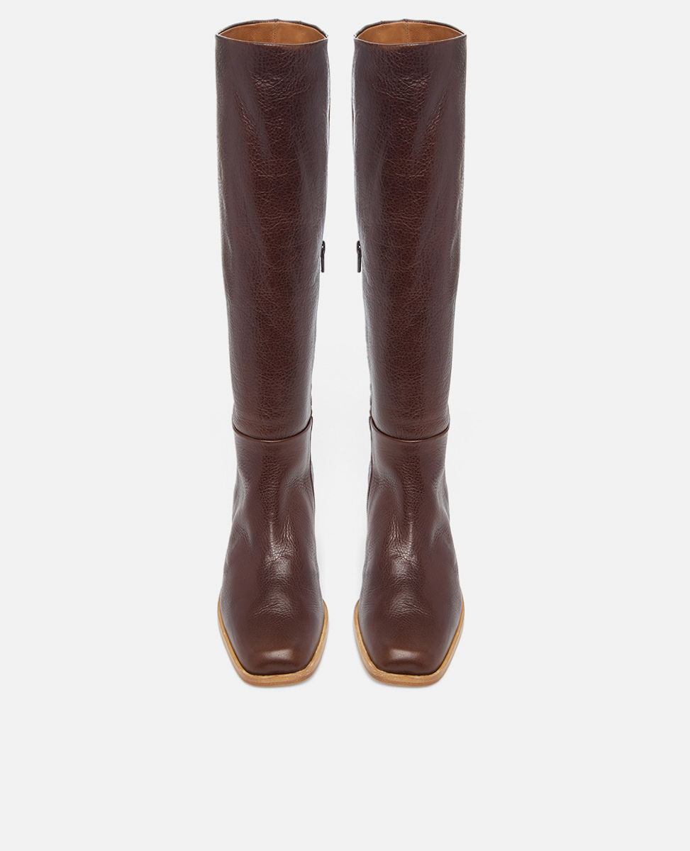 Pair of brown knee-high boots on a white background