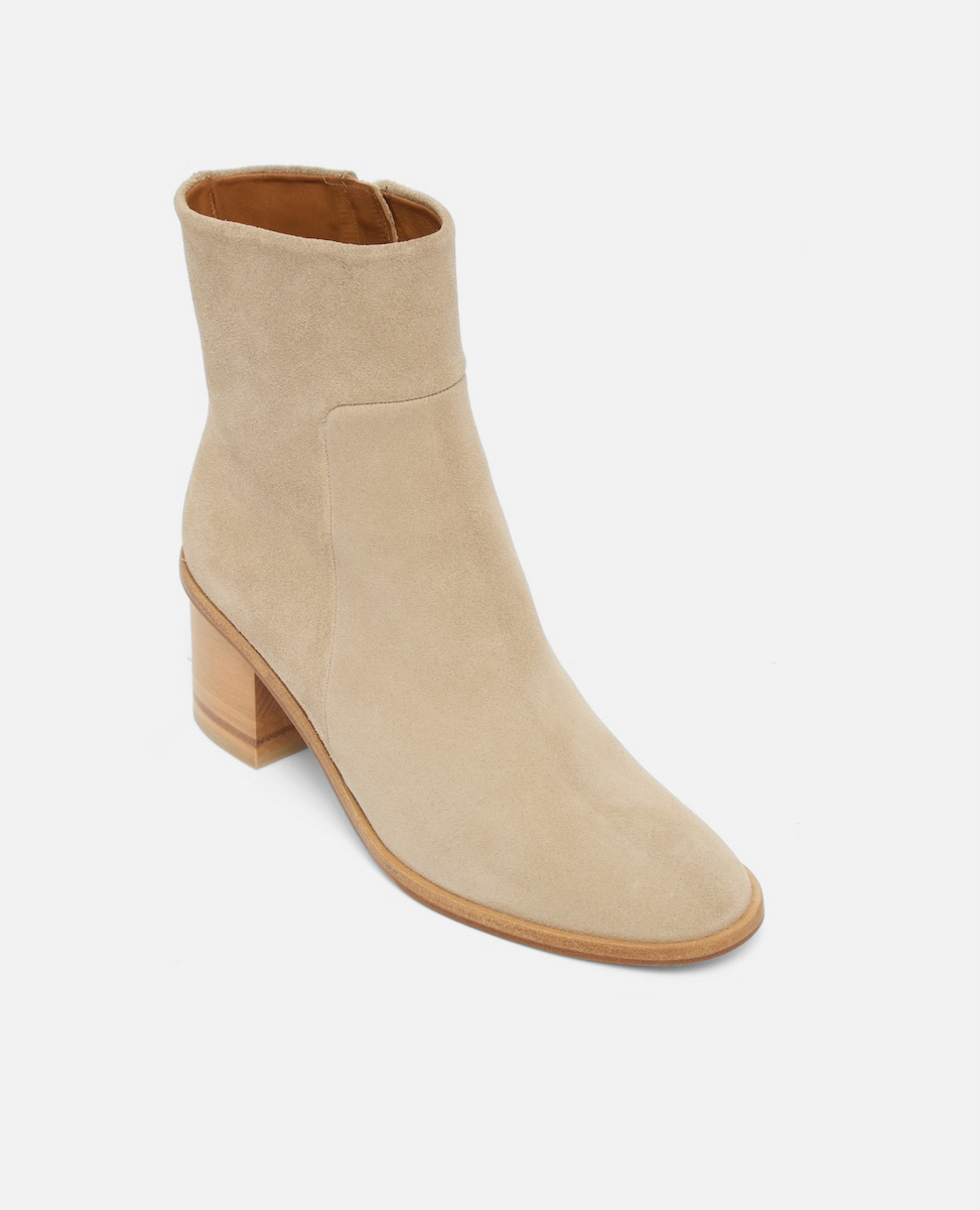 Beige ankle boot on a white background