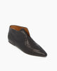Black leather flat shoe on a white background 2