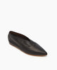 A sleek, black leather flat shoe with a pointed toe, smooth texture, and a minimalist design featuring a low-cut vamp and thin brown sole. 4