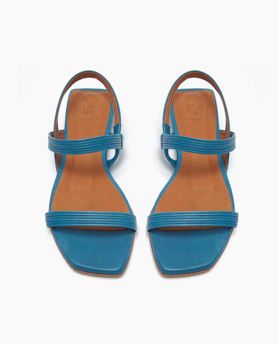 Front view of the Ferhana Sandal with a 10mm heel and barely there straps to highlight delightful shapes and angle of a nearly nude foot.