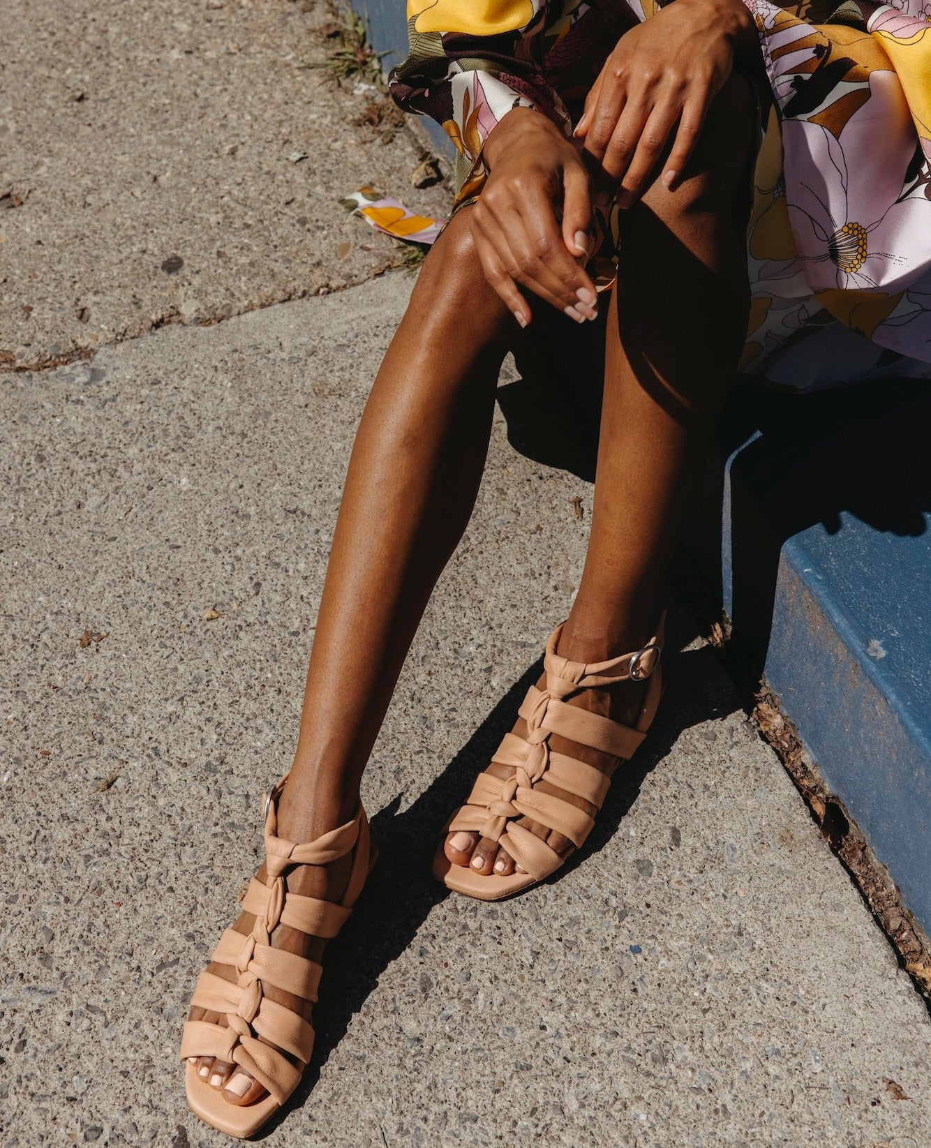 Legs and feet wearing the Flair Sandal in Fawn.