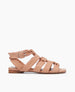 Side view of the Flair Gladiator Sandal in Fawn featuring the softest, tubular leather straps that twist upward and are secured at the ankle by a buckle fastening. 1