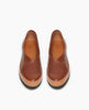 Top view of Caramello leather Coclico Glace flat high-vamped V cut upper, vacchetta bumper and green EVA sole. 3