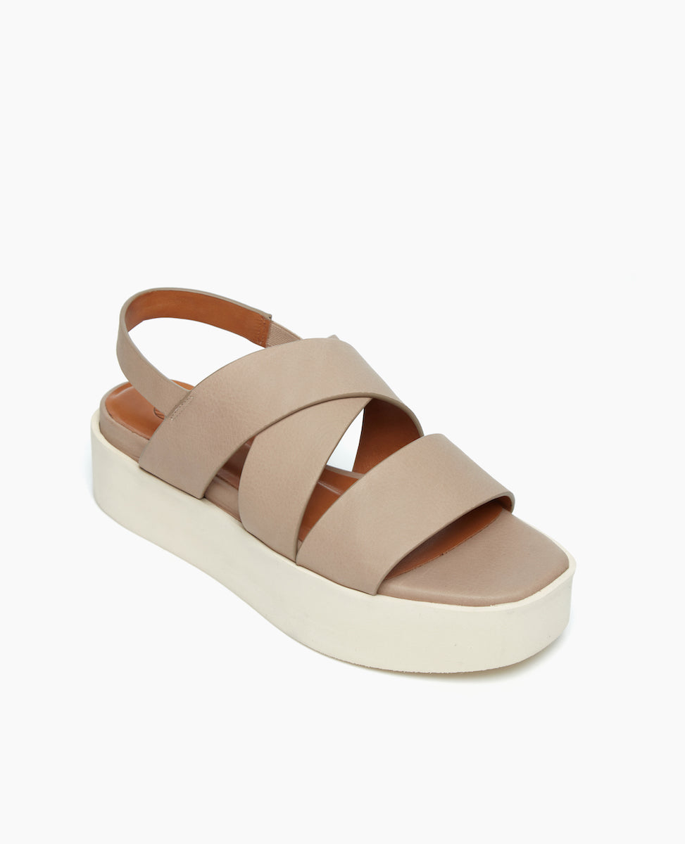 Angled view of the Iona Wedge in Grey Mist with wide straps and an elasticated slingback with a light-as-a-feather EVA platform to offer support with daily sprints around town.