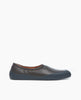 Side view of the Kai Sneaker in Deep Sea leather: featuring a high vamp, form-fitting, elasticated leather upper inside a beautifully curved, recycled rubber sneaker shell. 1
