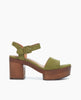 Side view of the Obion Clog in Mosstone with a quarter-strap with a wide front band and buckle closure. 1