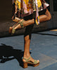 Woman's legs pictured outside with her right leg lifted and angled while wearing the Obion Clog in Mosstone. 5