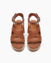 Front view of the Roli Clog in Cuoio with a sculptural wood heel. 3