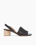 Side view of the Sokolo Heel with a wide, supple band in soft, black leather. 1
