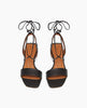 Front view of the Steph in Black leather featuring a wide front strap and cascading tie closures. 3
