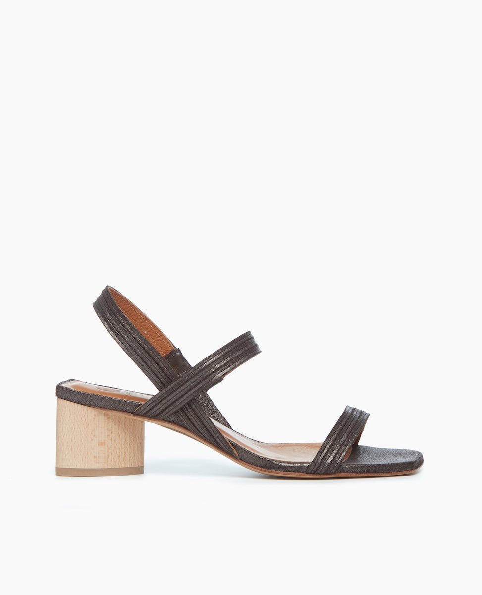 Side view of the Sterling Heel in Anthracite with a sculptural heel.