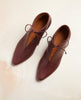 Top view of the Waffles Bootie in Merlot Leather; featuring a softly arched solid wood heel and gathered tie at the ankle revealing just enough to be both feminine and practical. 4