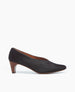 Side view of the Wynne Pump in Black Lux Hair: feature a high-vamped, sweetheart cut that flatters the foot, while a soft chisel-toe and rounded center seam binding detail  1