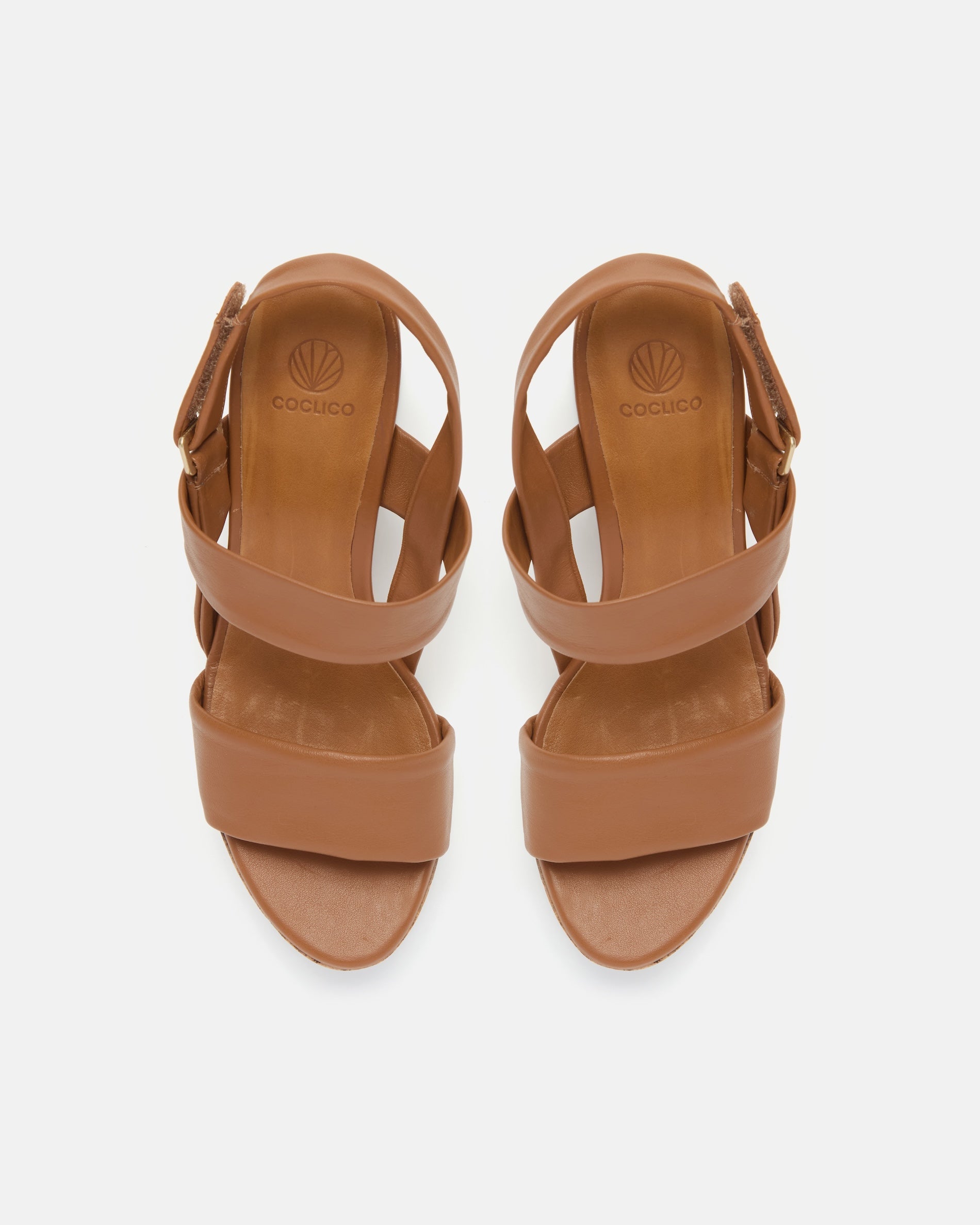 Top view of a cuoio nubuck leather platform sandal with tubular straps, adjustable velcro slingback, and cork platform sole