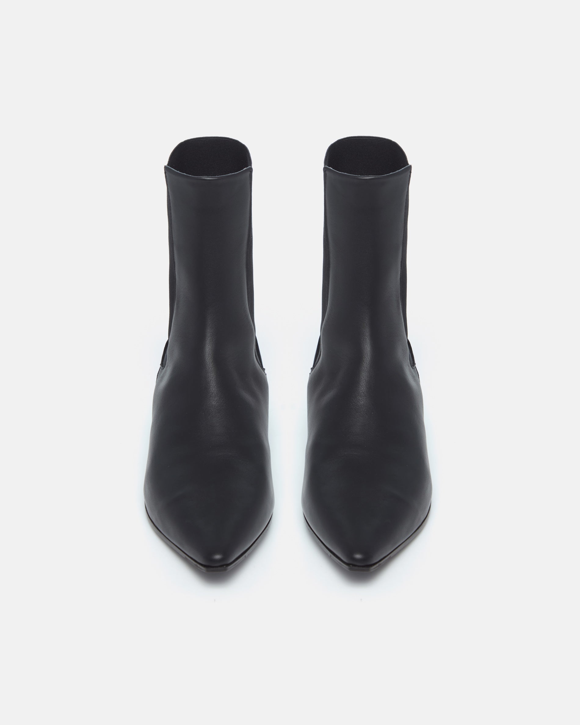 Pair of Coclico Cad Boots in black leather, front view of flat pointed toe Chelsea boots