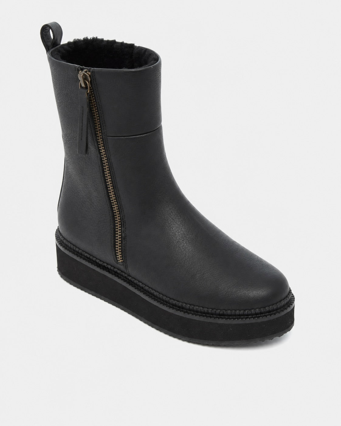 A black leather ankle boot with a side zipper, a pull tab, and a chunky platform sole, shown against a light gray background.