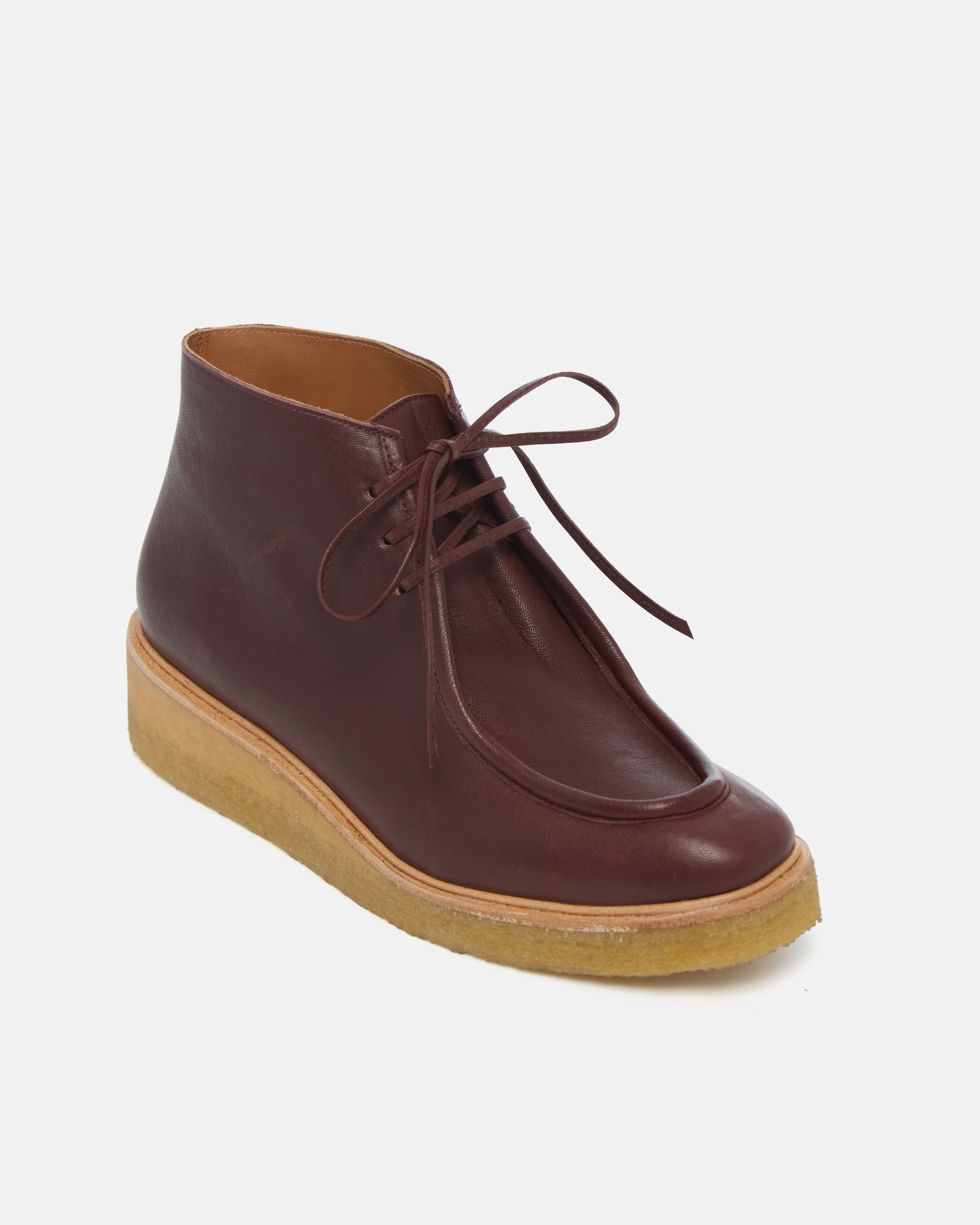 Coclico Hester Boot in Pecan leather, angled view of the moc toe and crepe sole