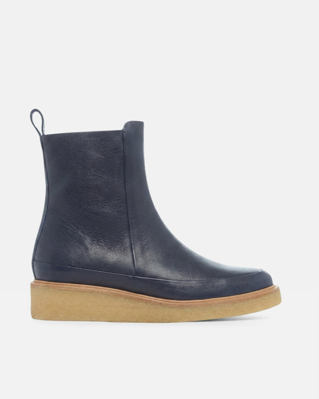 Coclico Hip Boot in Marino, a deep navy leather ankle boot with a crepe wedge sole
