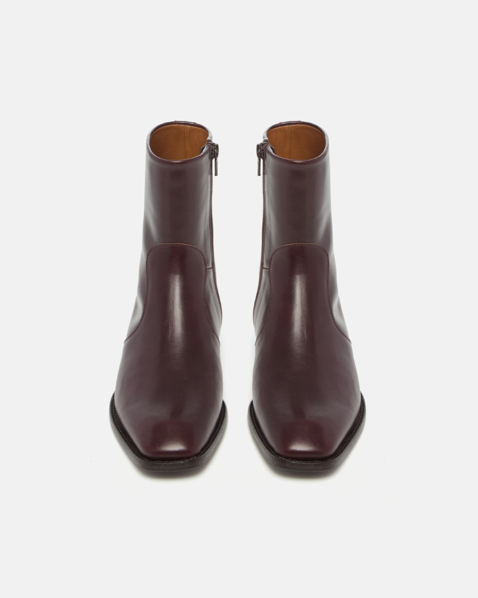 Pair of Coclico Hopper Boots in Oxblood leather, front view with side zips