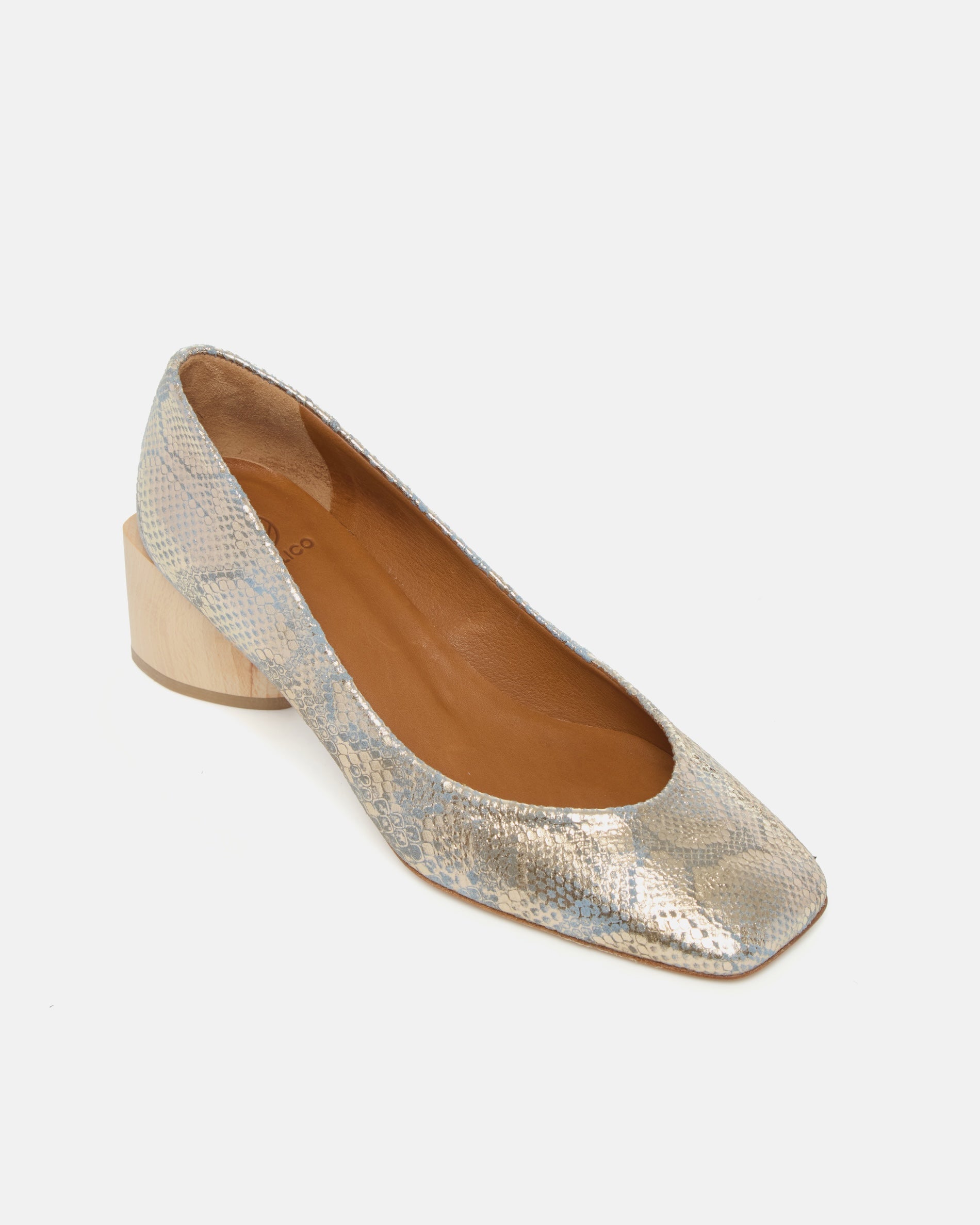Angled view of an opal blue python-print leather pump with a square toe and a solid architectural wood block heel on a white background