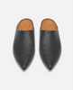 Pair of black leather shoes with tan interior on a light gray background 3