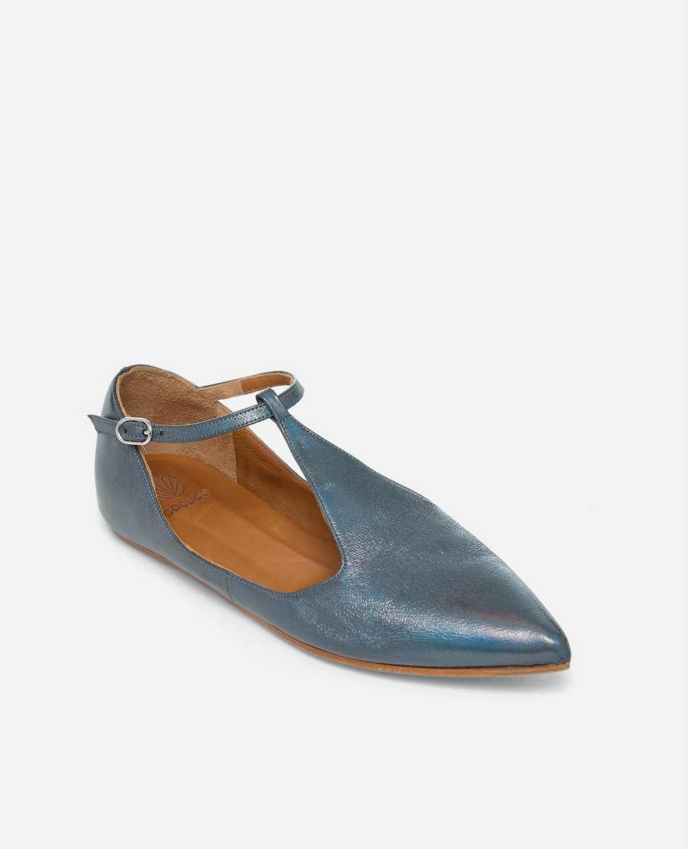 Blue flat shoe with a strap on a white background