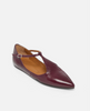 Maroon pointed-toe flat shoe with a thin strap on a white background 3