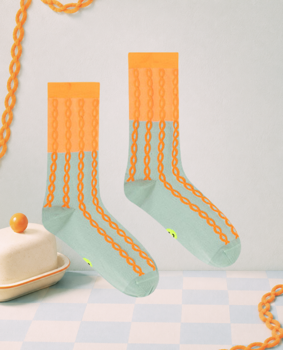 Dr Bloom Plait Socks in Mint-Orange, mint mesh socks with an orange vertical chain pattern and wide orange cuff