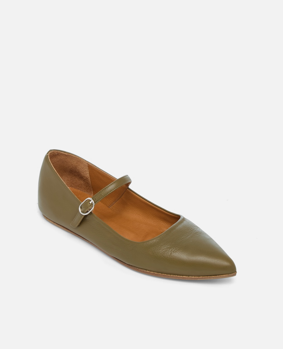 Green flat shoe with a strap on a white background