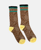 Pair of brown socks with black polka dots, yellow toes, and green accents on a white background 2