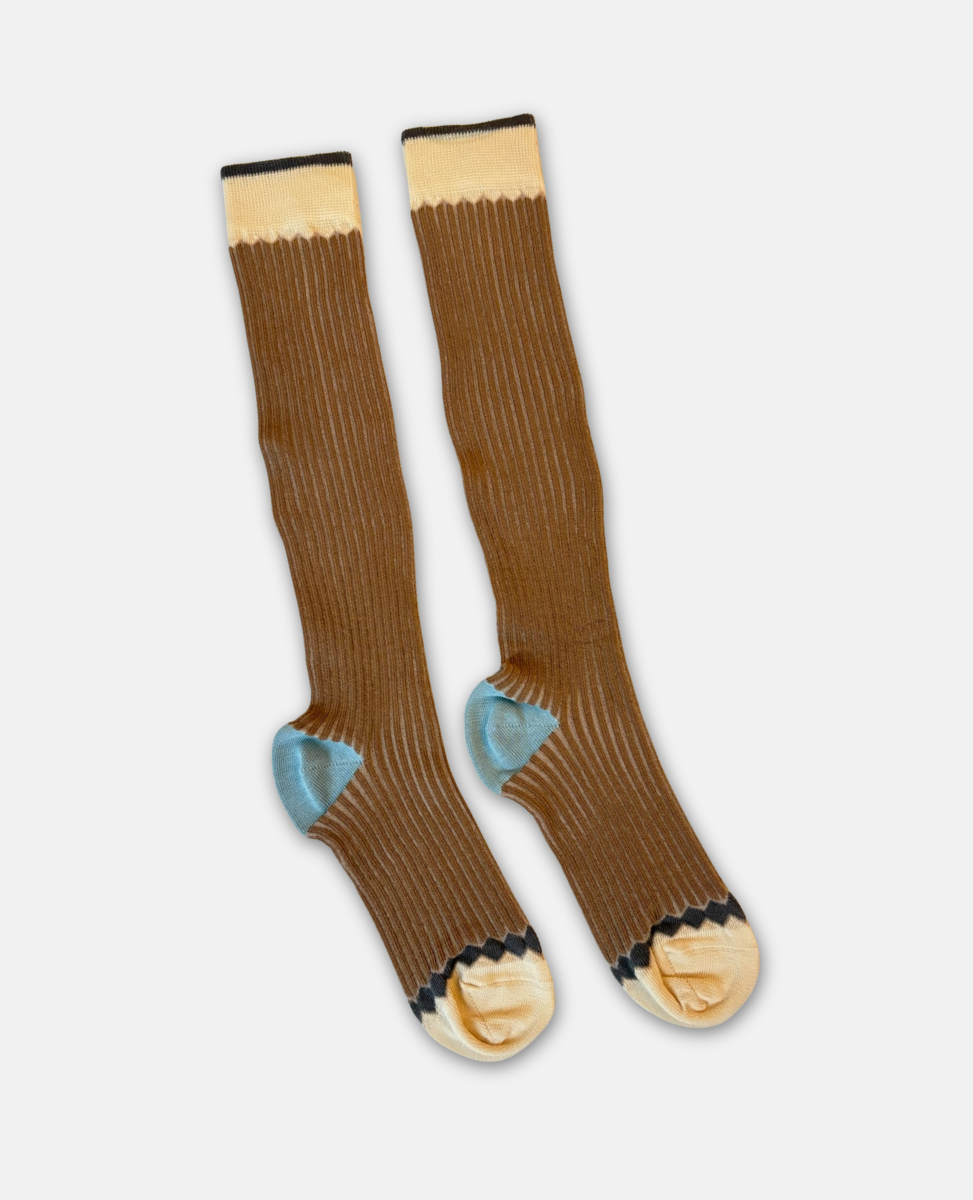 Pair of brown knee-high socks with light blue accents on a white background