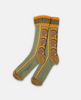 Pair of green socks with brown footprints on a white background 2
