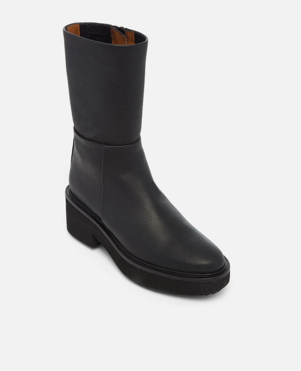 Black boot on a white background