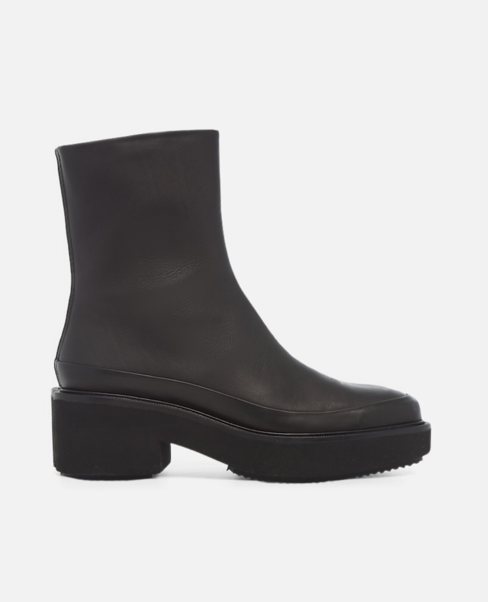 Black ankle boot on a white background