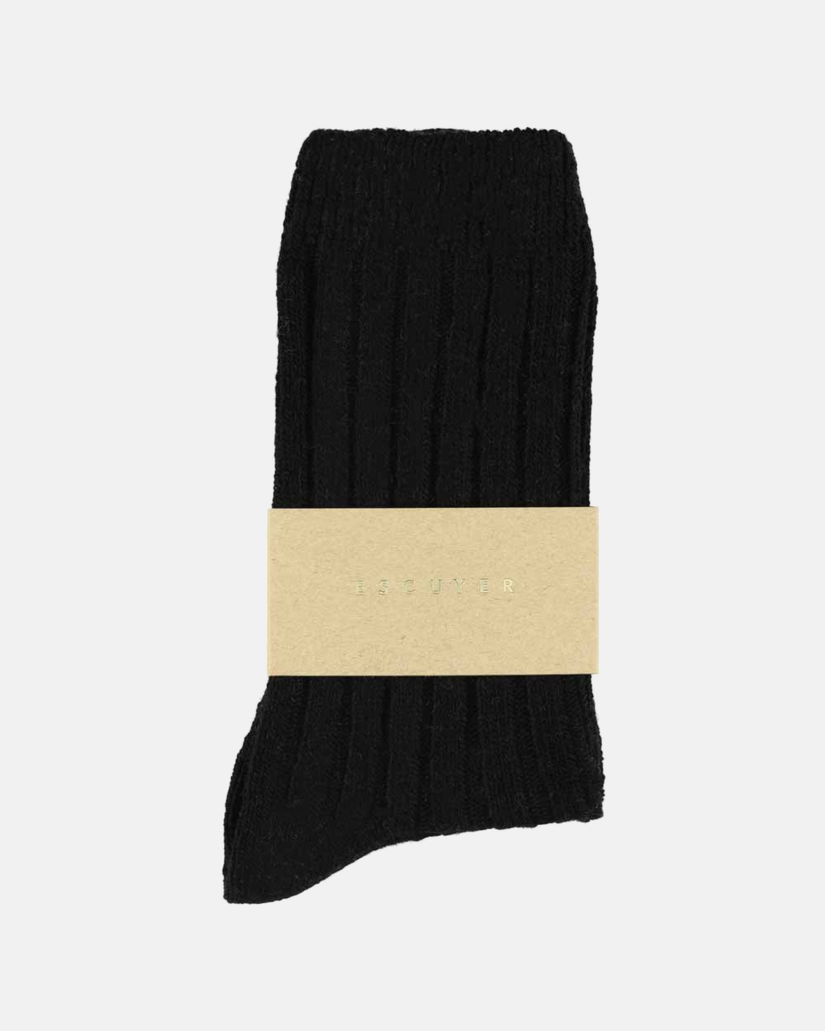 Escuyer black socks folded with brand band on a light grey background