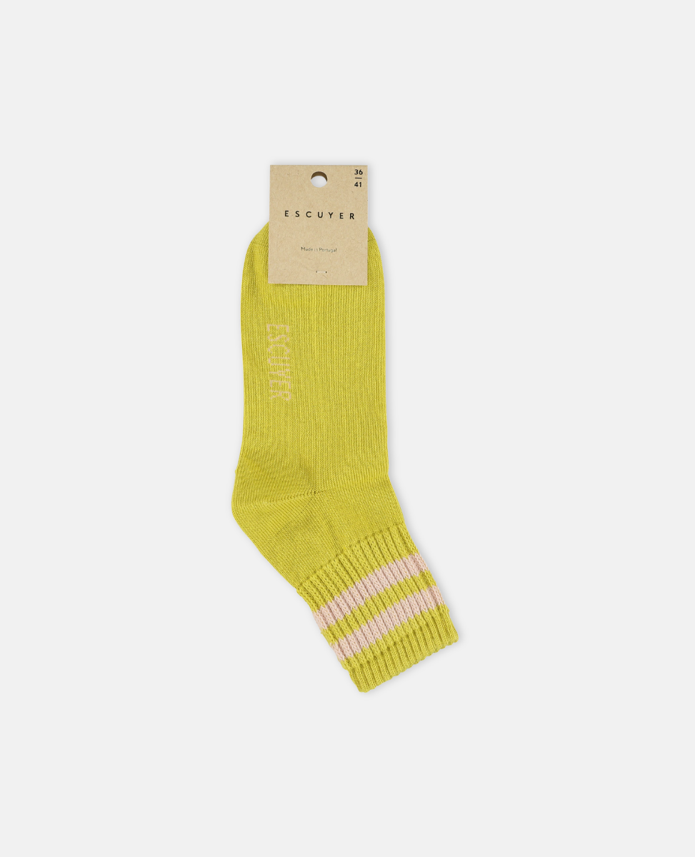 Escuyer Yellow sock with pink stripes on a white background