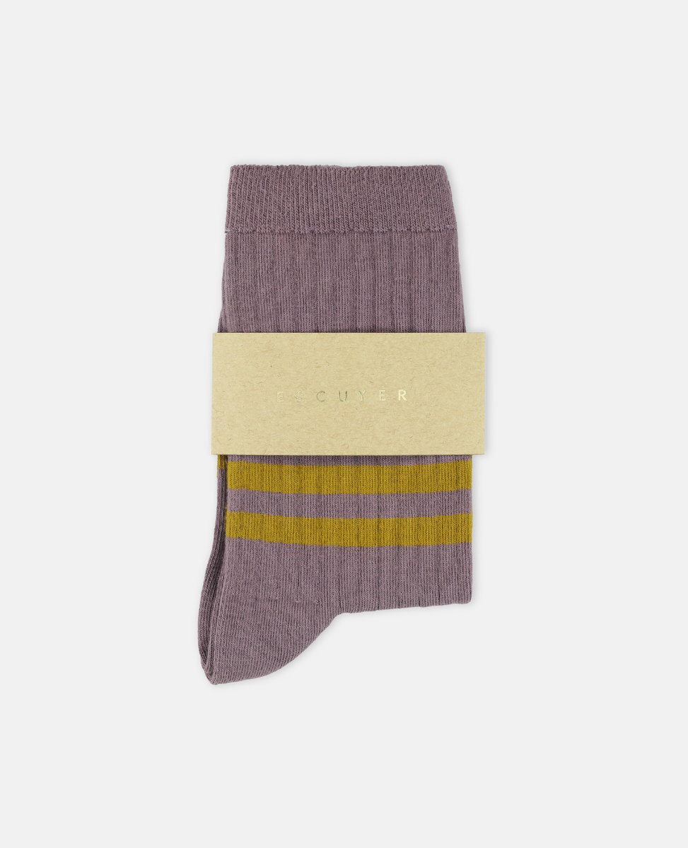 Escuyer purple sock with yellow stripes and a beige label on a white background