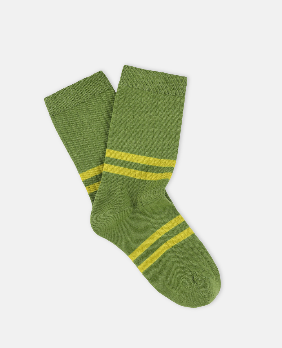 Escuyer Green socks with yellow stripes on a white background