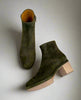 Third view of a clog bootie in split suede with a deep olive hue 1