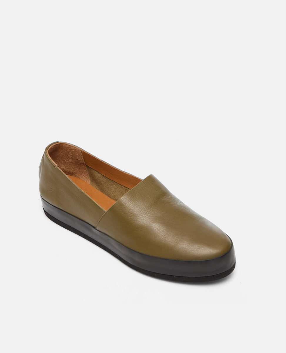 Brown leather loafer shoe on a white background