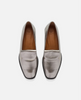 Pair of silver loafers on a white background 1