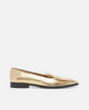 Gold loafer shoe on a white background 2