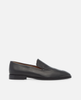 Black loafer shoe on a white background 2