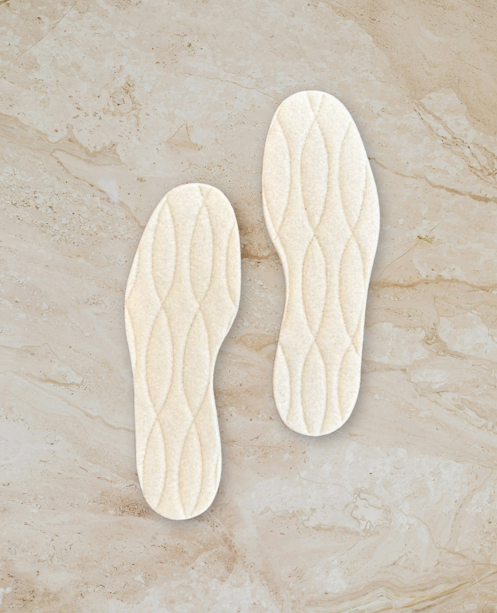 warm insole on stone