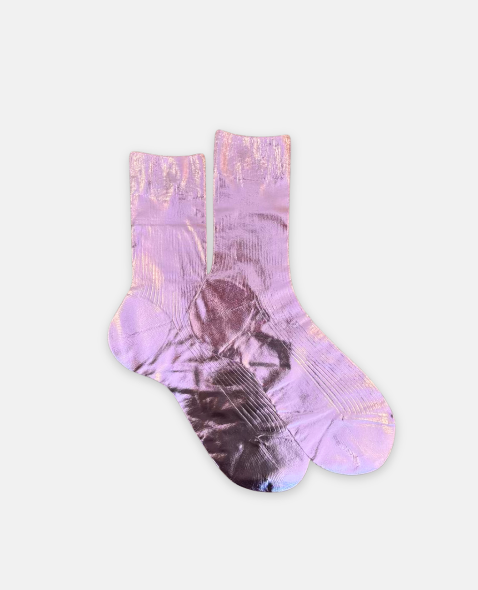 Pair of metallic foil lilac silk socks by Maria La Rosa on a light gray background