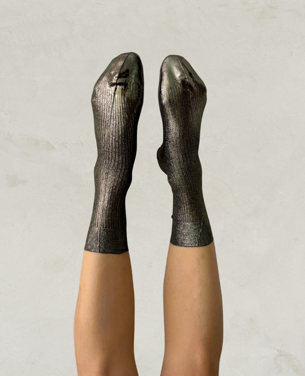 Maria La Rosa grey metallic socks worn by a person on a plain background