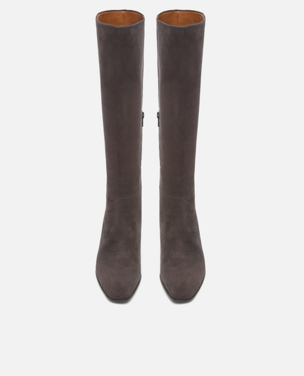 Pair of brown knee-high boots on a white background